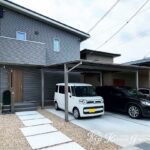 深いグリーンをアクセントにしたシンプルな外まわり　守山市