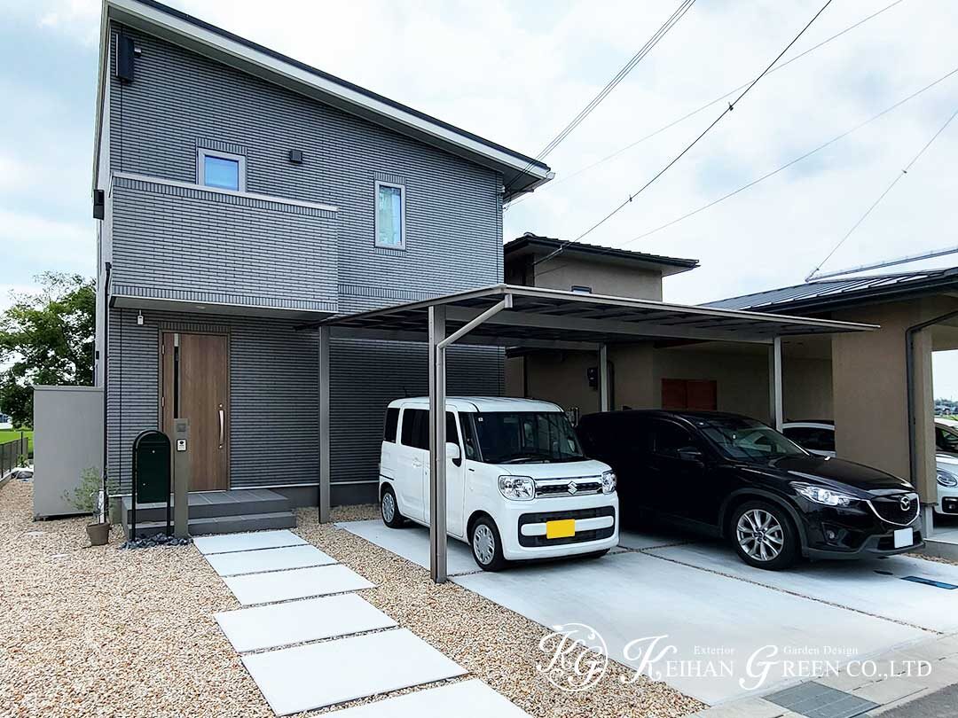 深いグリーンをアクセントにしたシンプルな外まわり　守山市